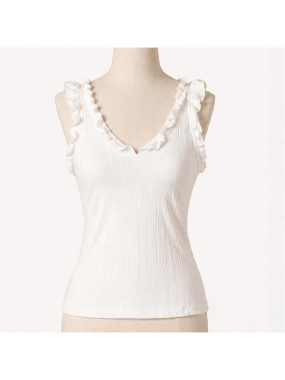 Semi fitted True Craft white ribbed knit tank top with ruffle trim in a size S